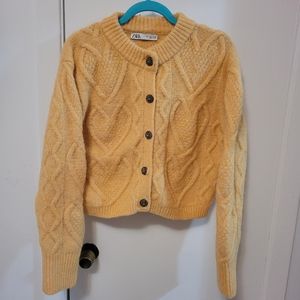 Orange cable knit cardigan